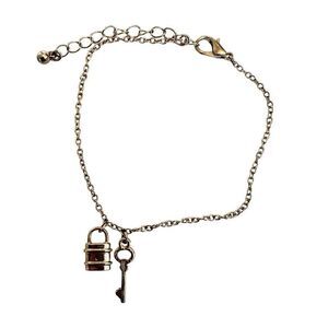 Gold tone lock and key charm chain bracelet